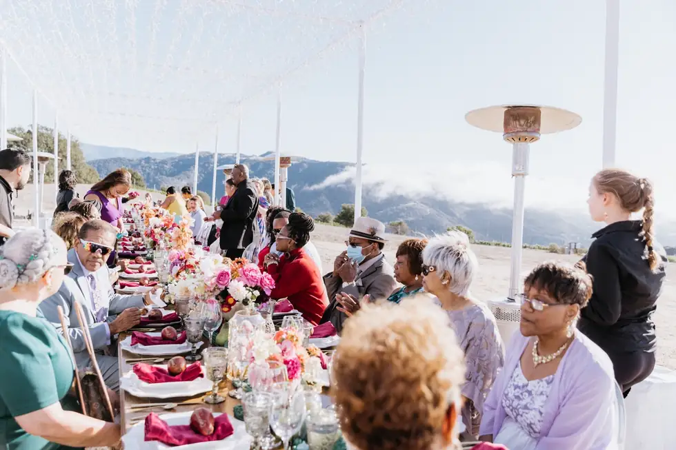 Long tables under string lights