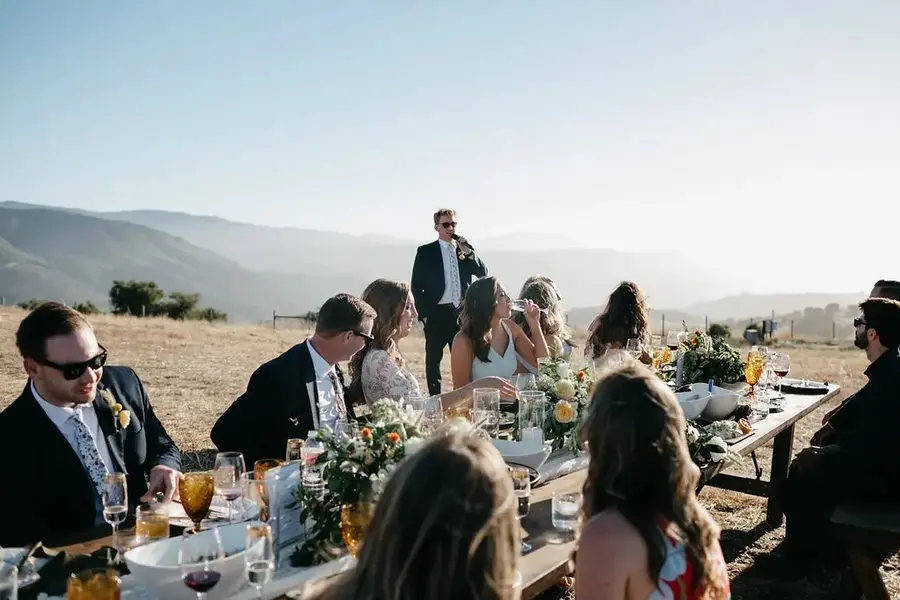 A toast at the head table above the valley